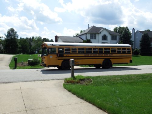 Buses transport NGE students to Hudson schools.